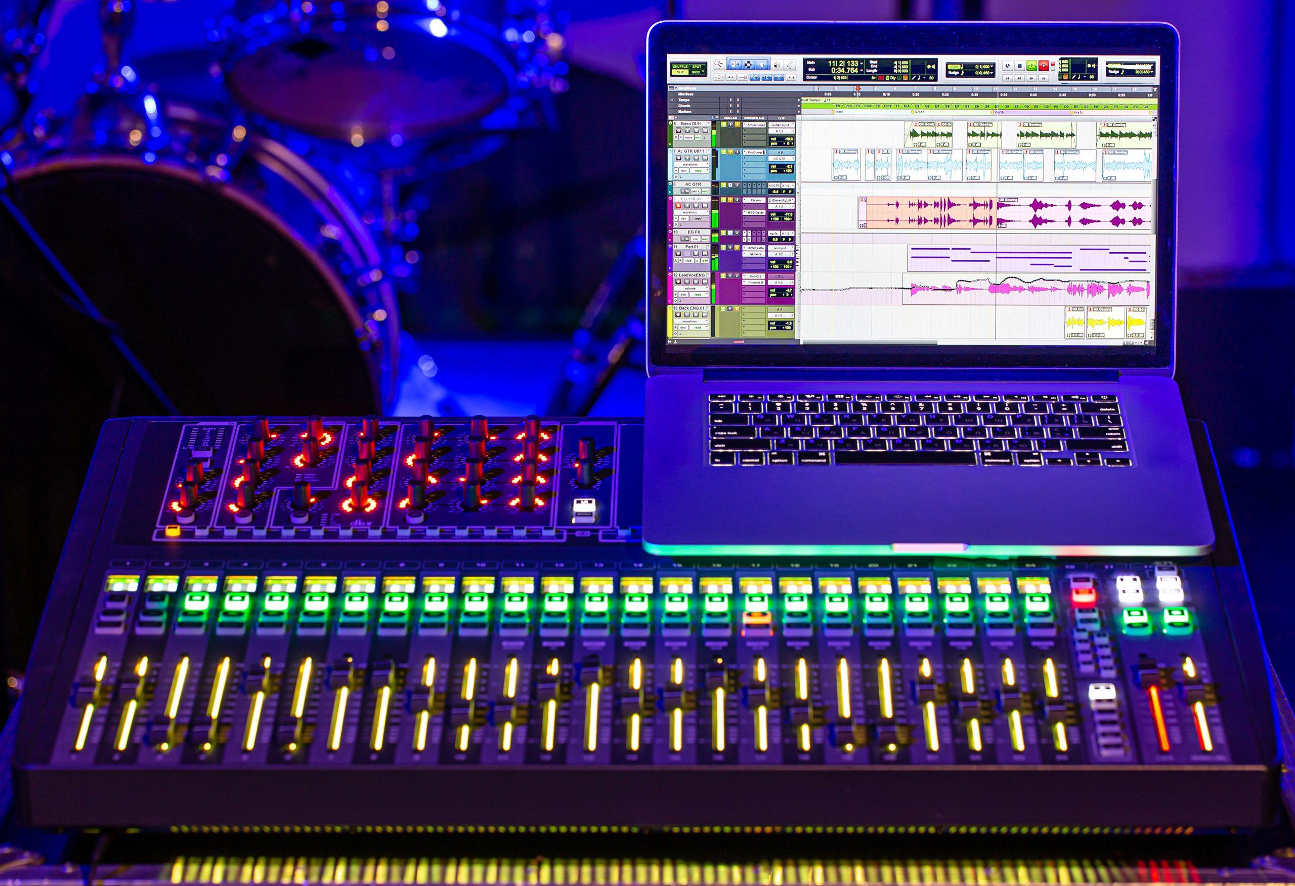 Digital mixer in a recording Studio , with a computer for recording sounds and music. The concept of creativity and show business